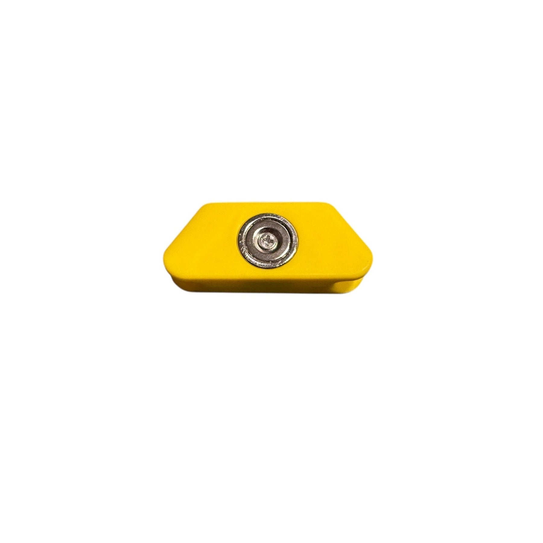 Ratchet Strap Magnetic Application Aid: Yellow plastic block with metal insert, designed to secure wire claw hooks on 50mm ratchet straps, streamlining lorry loading.